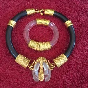 Glass and metal necklace and bracelet.